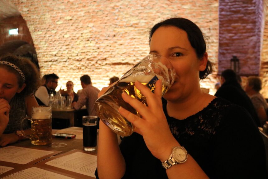Tour Guide Sonja Irani and an extra large beer in Munich, Germany