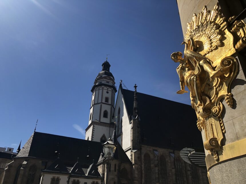 The St Thomas Church in Leipzig with a blue sky in the back on sunny summer's day.